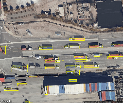 Fig 4c. Aerial view of a road with many trucks